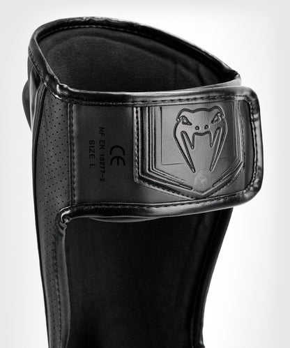 PROTÈGE-TIBIAS VENUM ELITE EVO - NOIR/NOIR