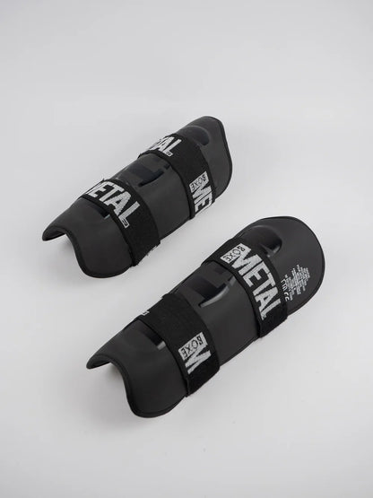 PROTEGE TIBIA PRO. NOIR METAL BOXE